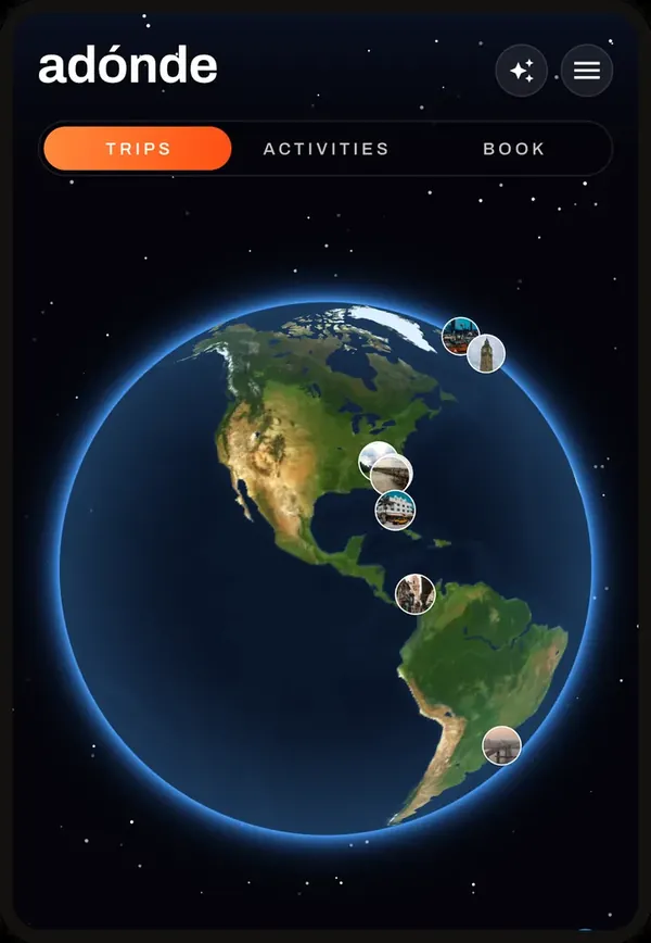 The Adónde globe with country flags and photo pins